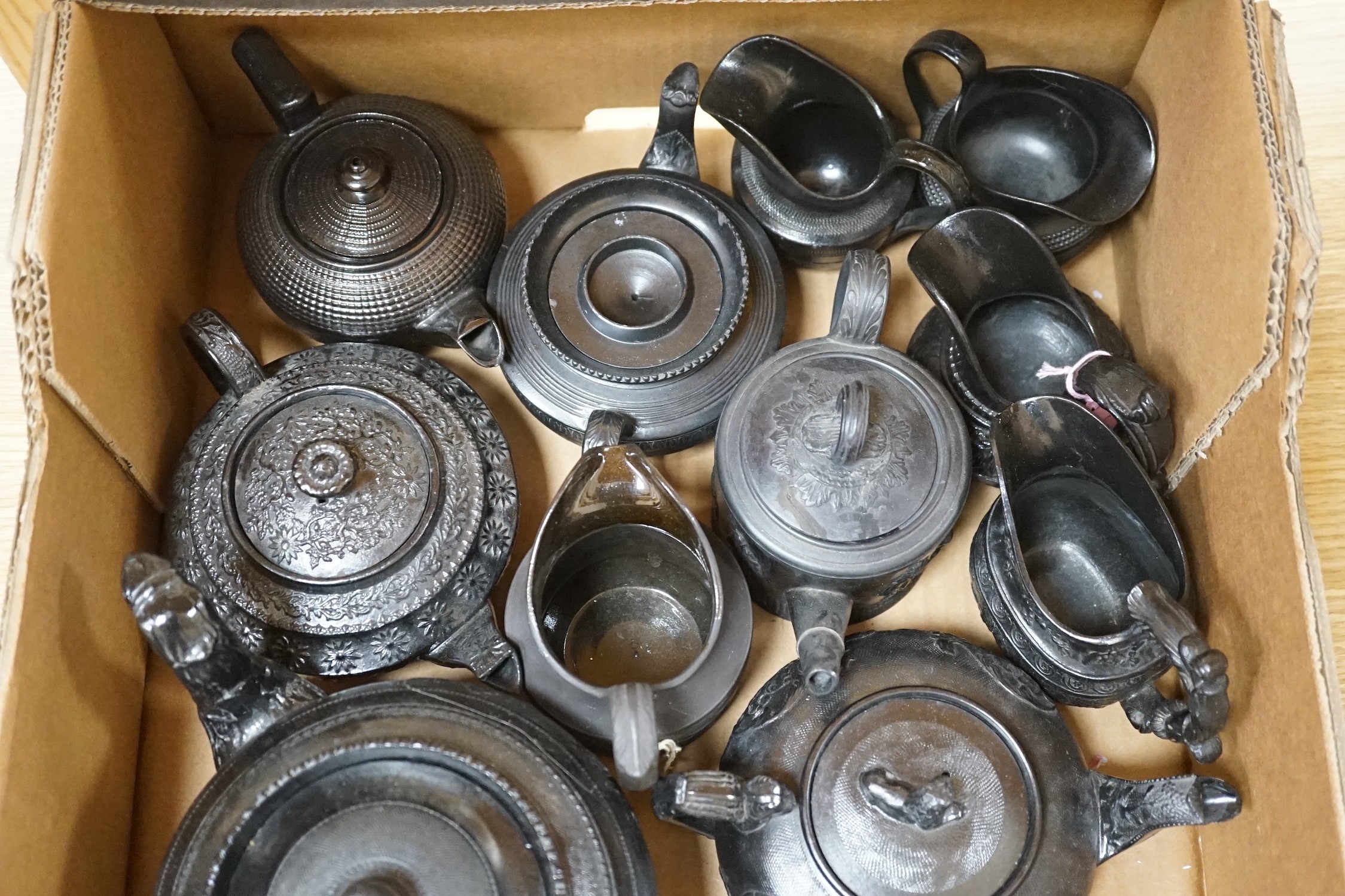 A selection of Jackfield type black glazed teapots, 19th century